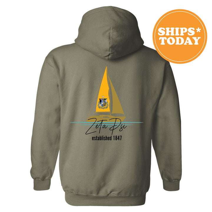 a hoodie with a sailboat on it