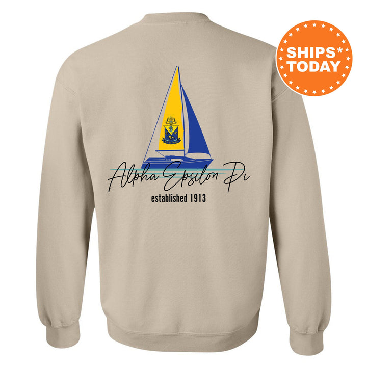 a sweatshirt with a sail boat on it