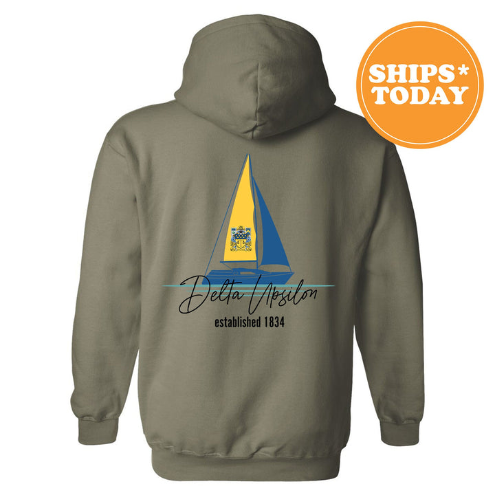 a hoodie with a sailboat on it