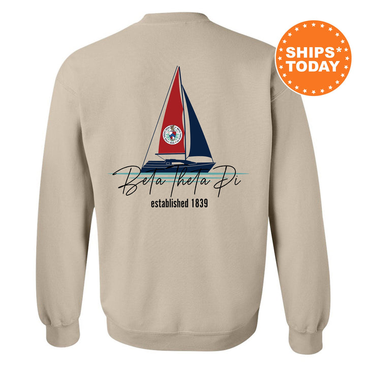 a sweatshirt with a sail boat on it