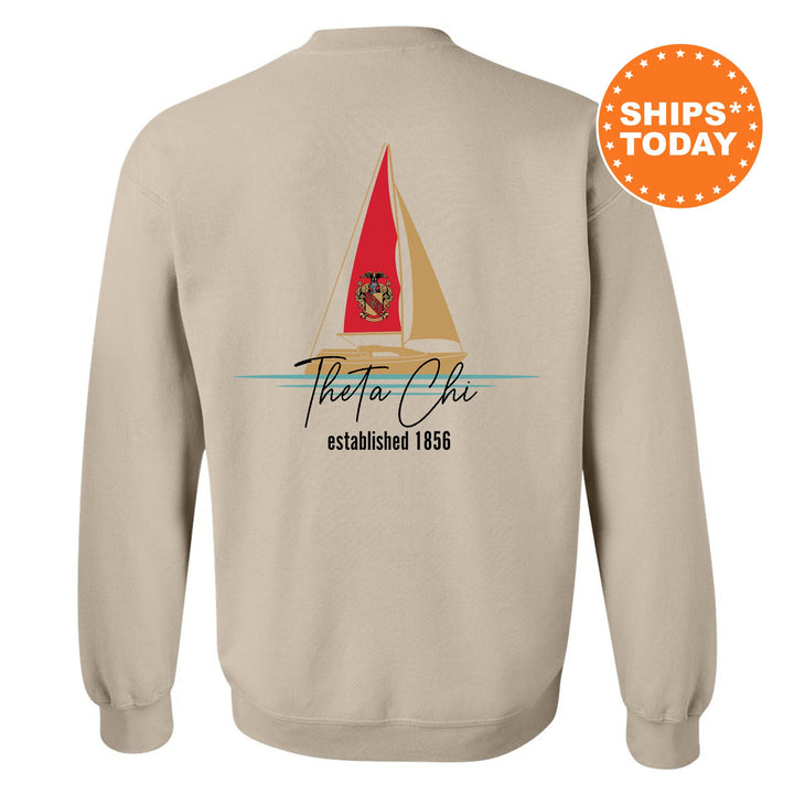 a sweatshirt with a sail boat on it