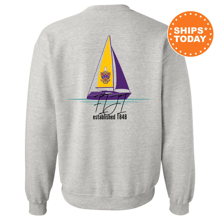 a sweatshirt with a sail boat on it