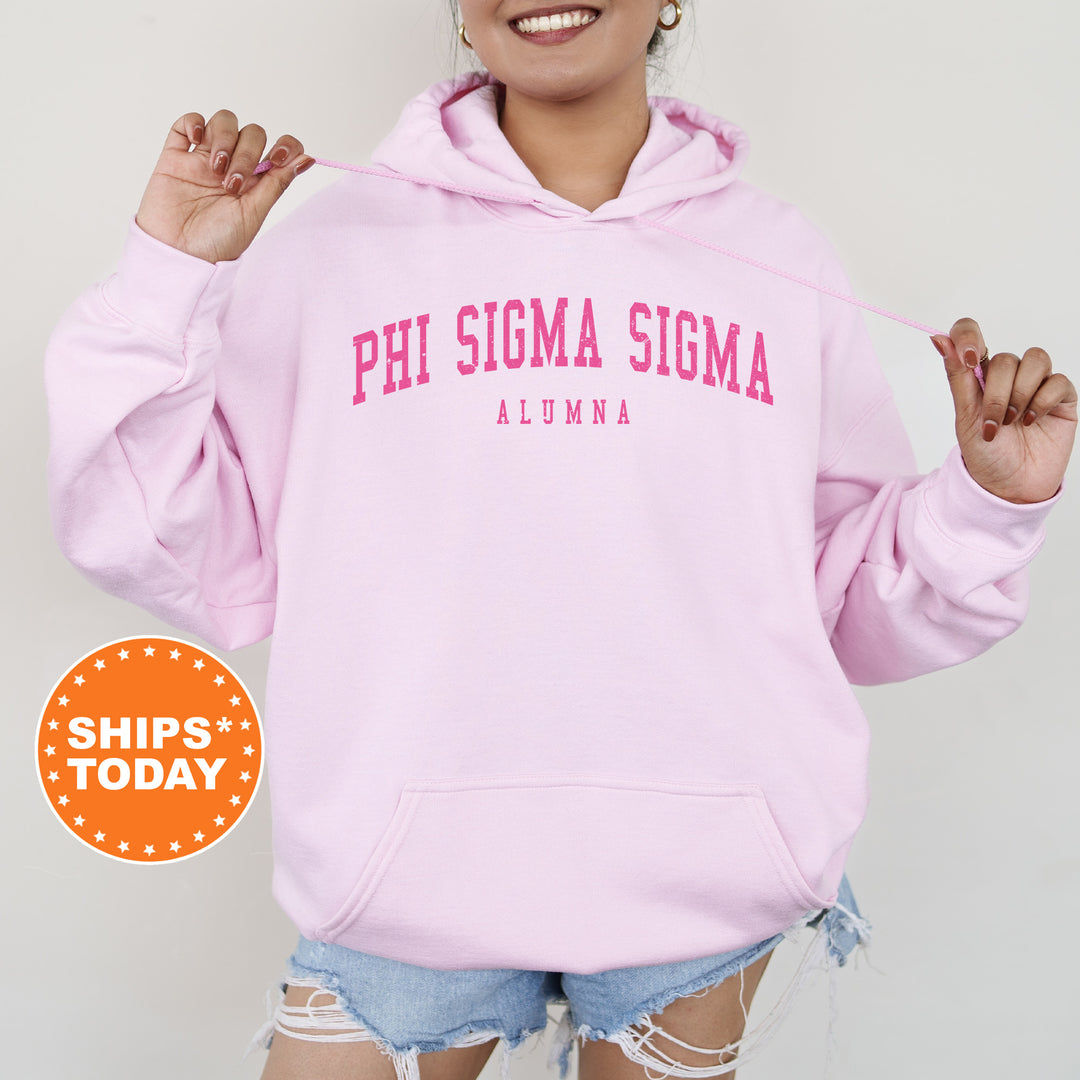 a woman wearing a pink hoodie with the words phi sigma sigm