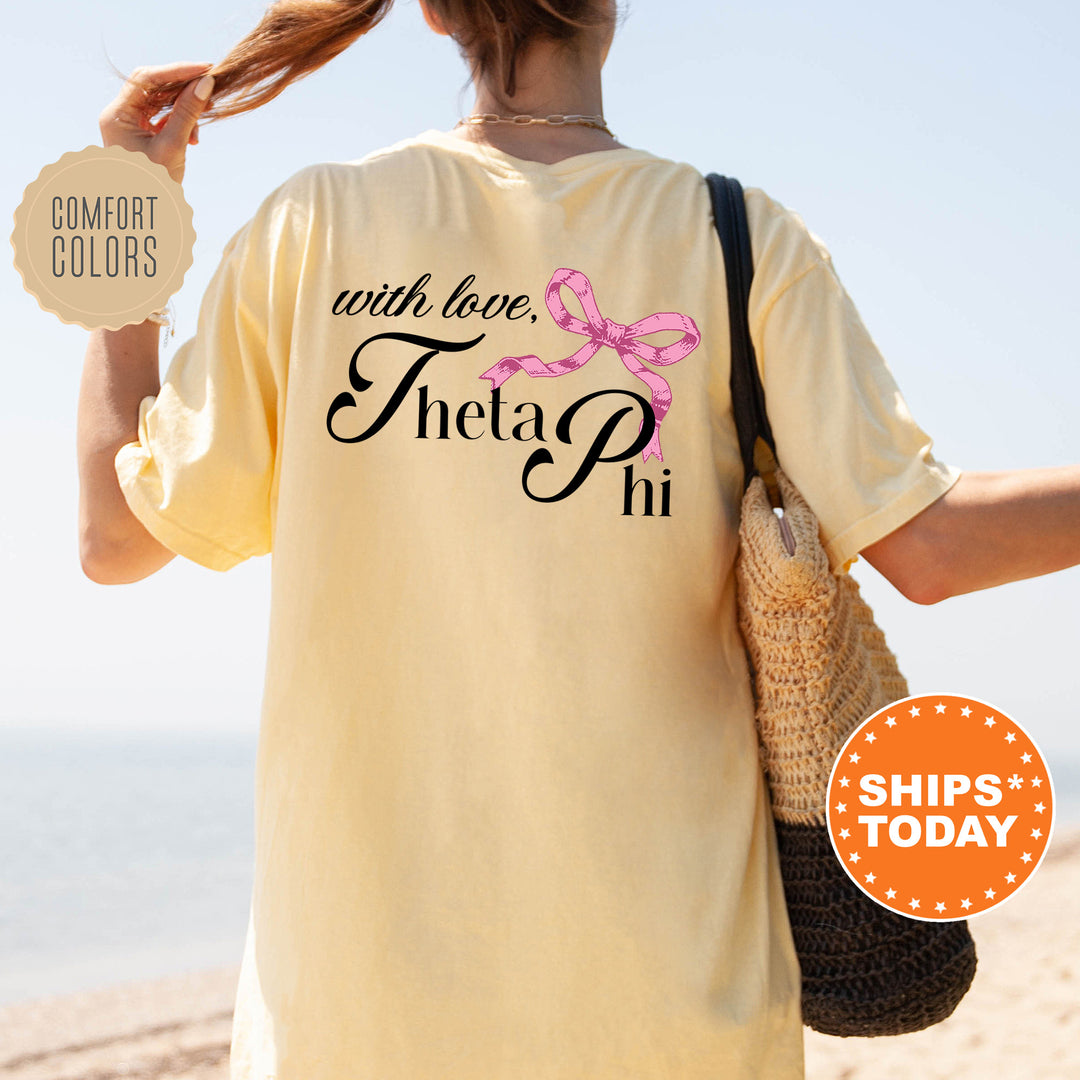 a woman walking on the beach with a t - shirt that says, with love