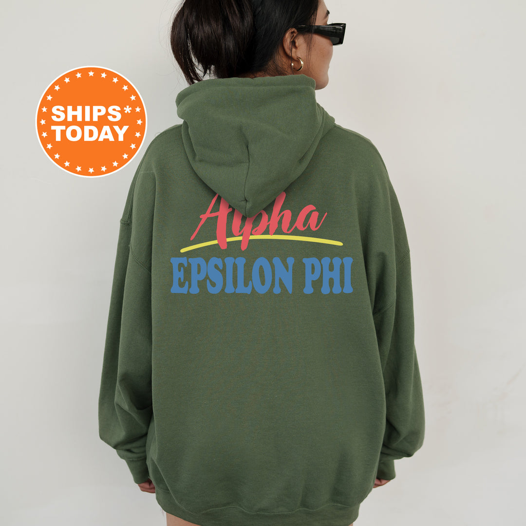 A person wearing a green hoodie with the text "Alpha Epsilon Phi" printed on it.