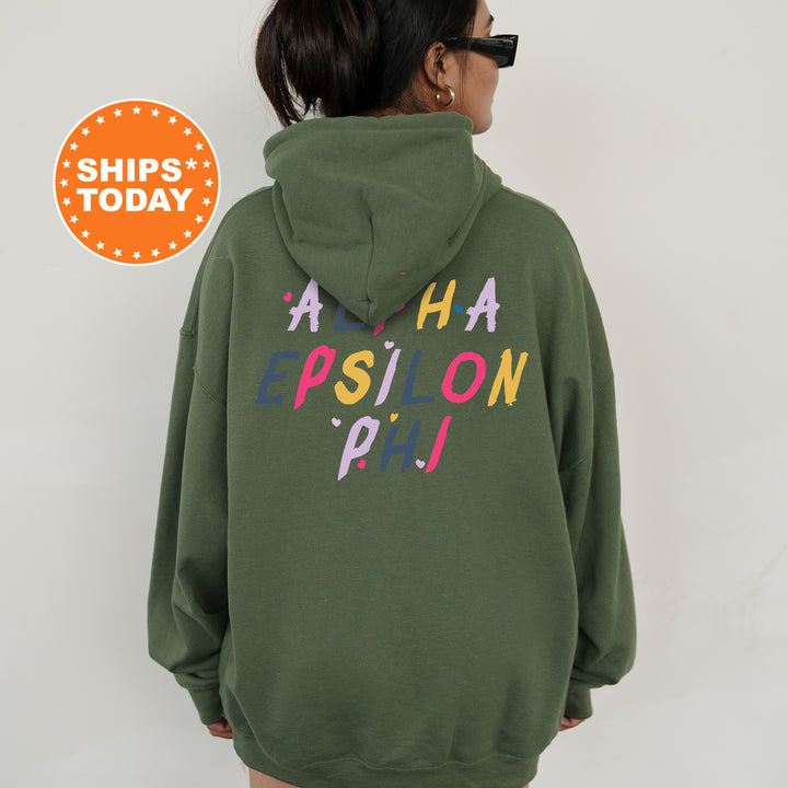 a woman wearing a green hoodie with the words ah fashion phi on it