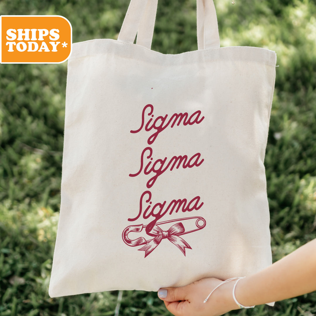 a person holding a tote bag with a message on it