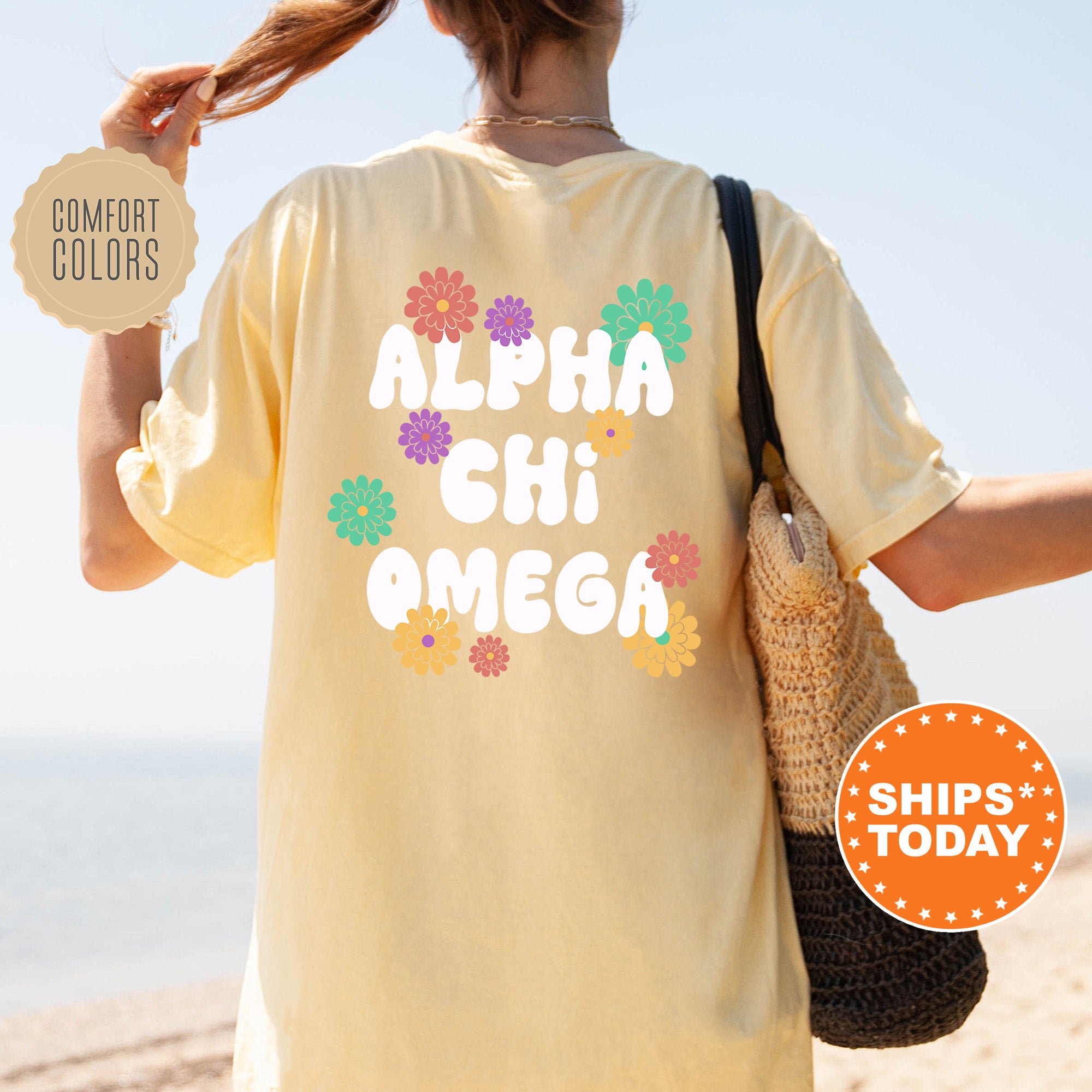 a woman is walking on the beach with her back to the camera