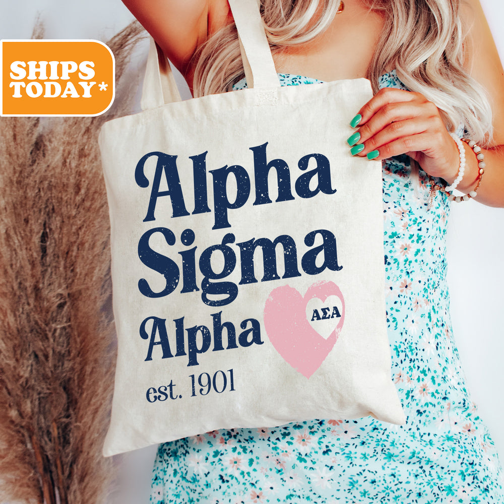 a woman holding a tote bag with the words, aloha, and