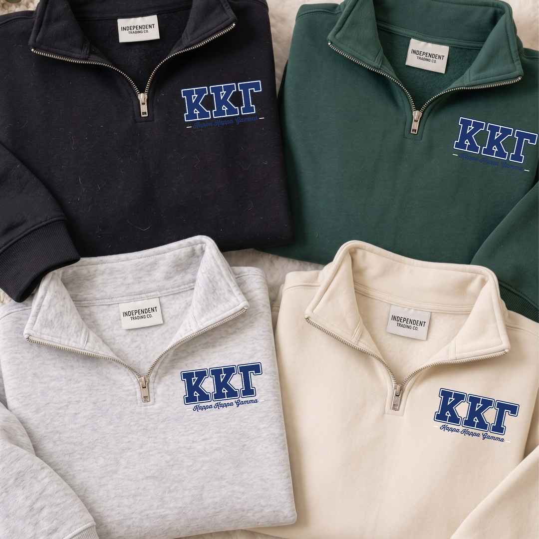 a collection of four sweatshirts, each with the letters "KKT" printed on them. The sweatshirts are arranged in a row, with one black, one green, one gray, and one beige.