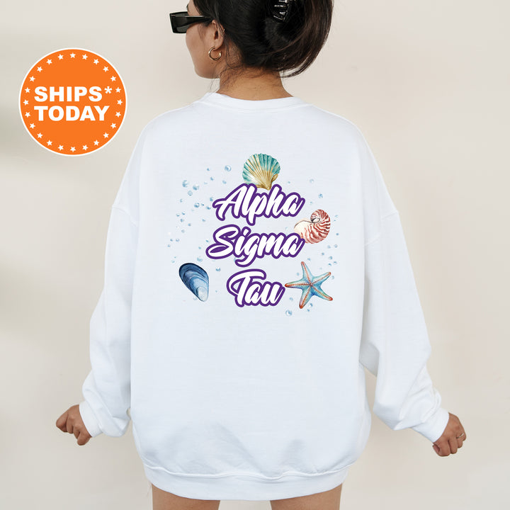 a woman wearing a white sweatshirt with the words aloha signa talu