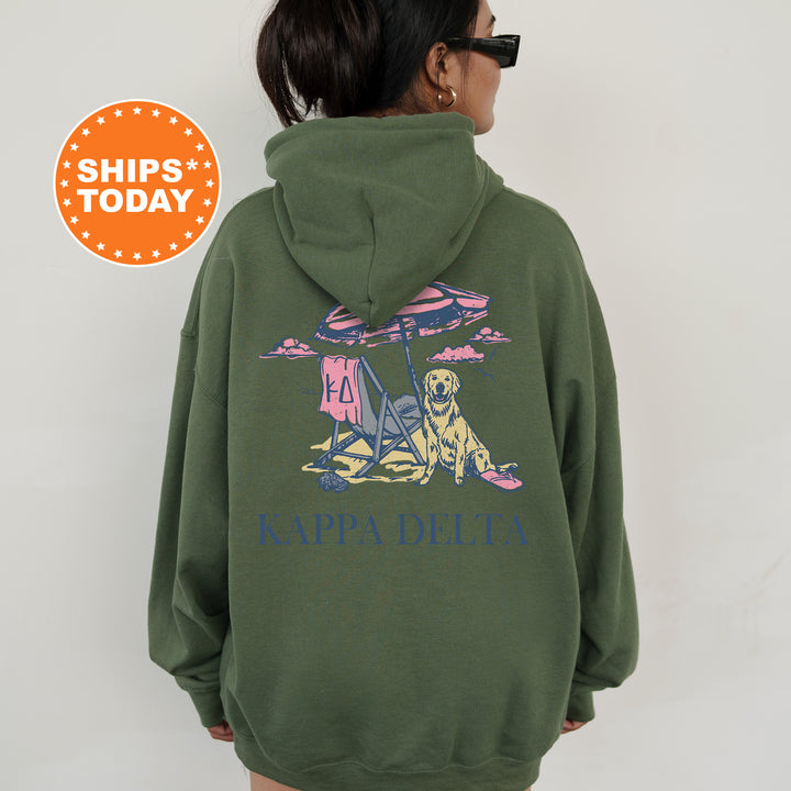 a woman wearing a green sweatshirt with a picture of a dog on it