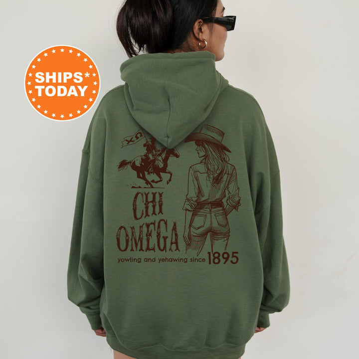 a woman wearing a green hoodie with a picture of a girl on it