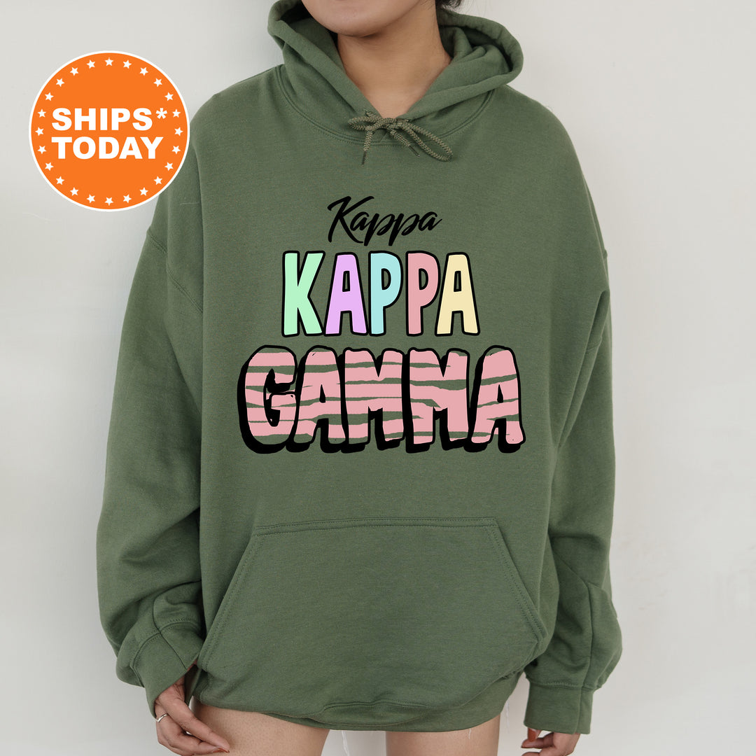 a woman wearing a green hoodie with the words kappa kappa