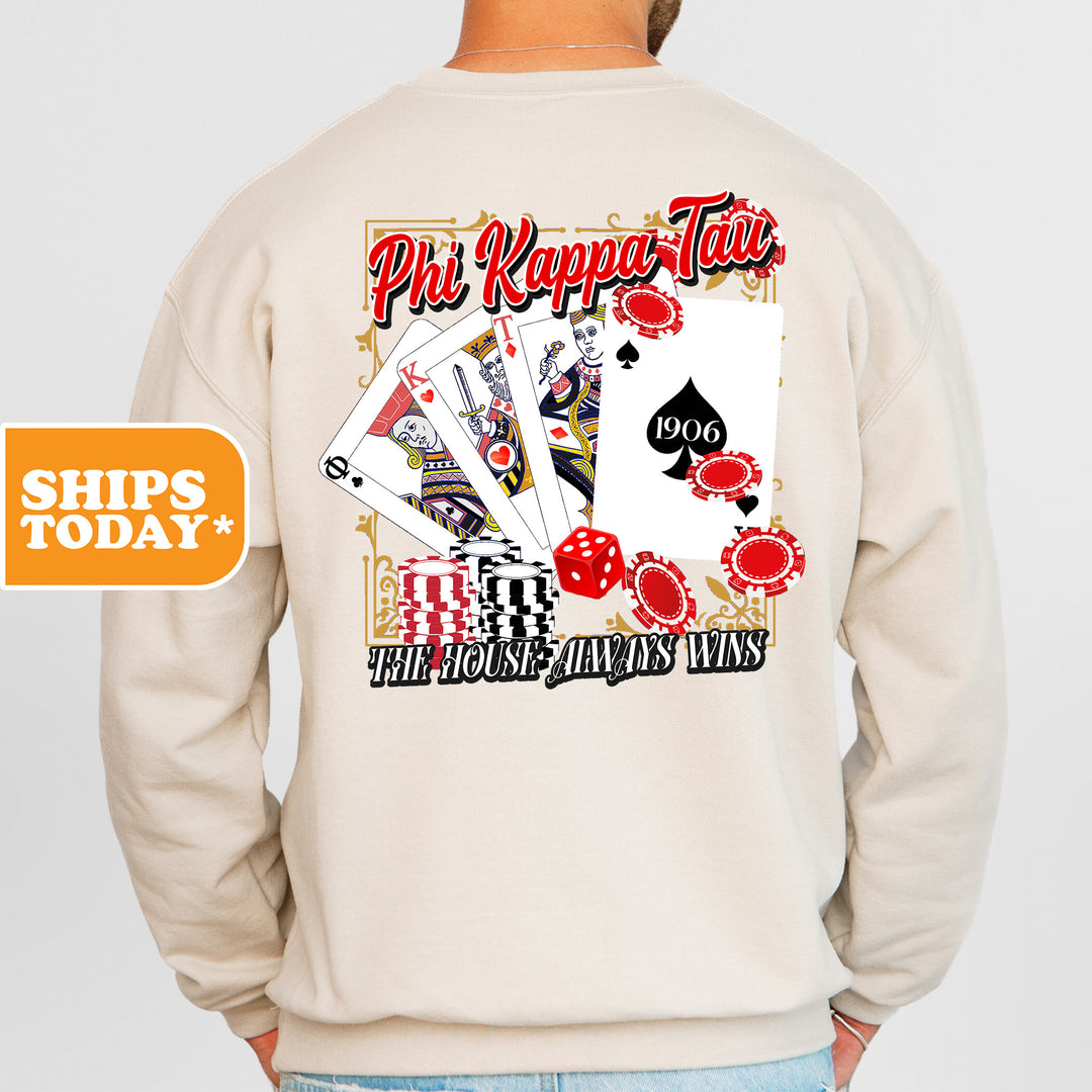 a man wearing a sweatshirt with a back print of playing cards