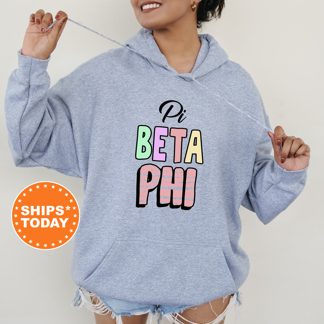 a woman wearing a blue hoodie with the words beta ph on it