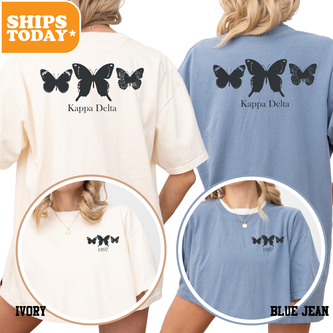 a woman wearing a tshirt with butterflies on it