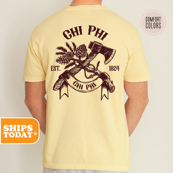 a man wearing a t - shirt with an image of a hammer and two crossed