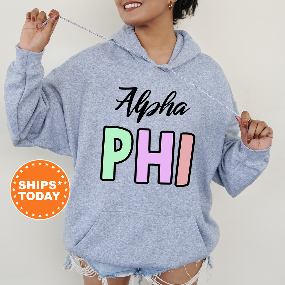 a woman wearing a sweatshirt with the word phi on it