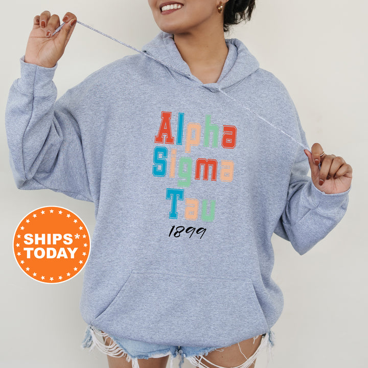 a woman wearing a blue sweatshirt with the words aloha, slim, ti