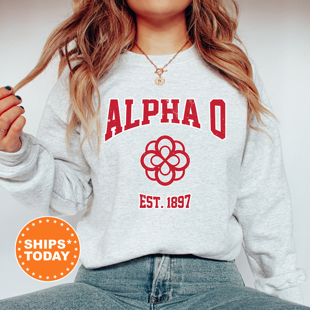 a woman wearing a sweatshirt with a flower on it
