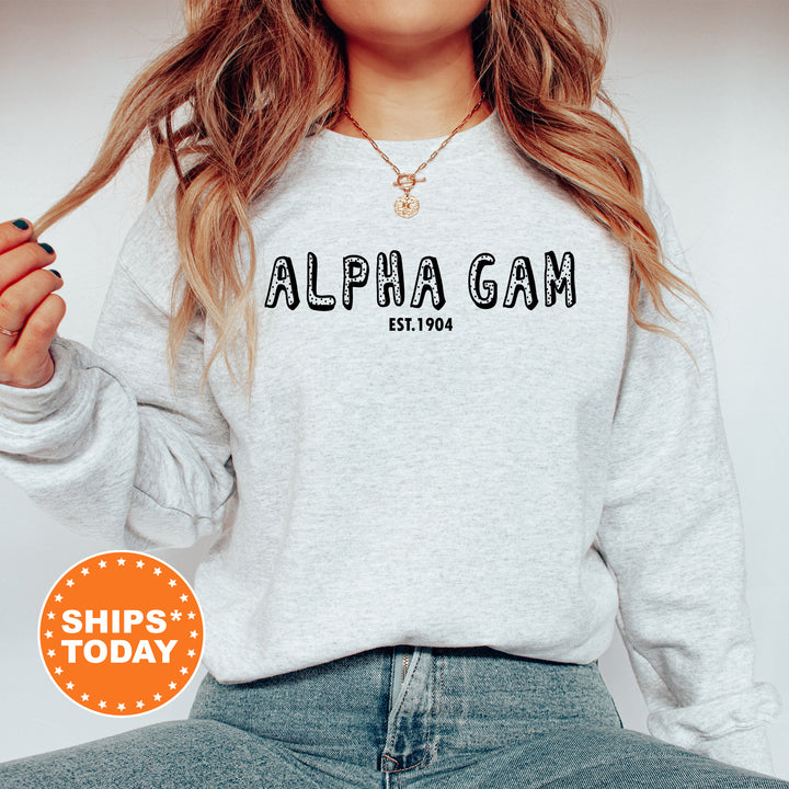 a woman wearing a sweatshirt that says alphagan