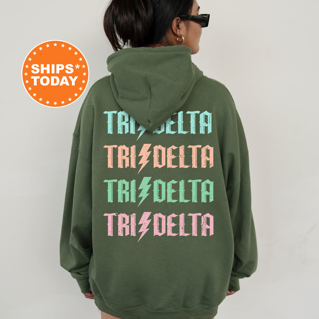 a woman wearing a green hoodie with the words tralella, trale