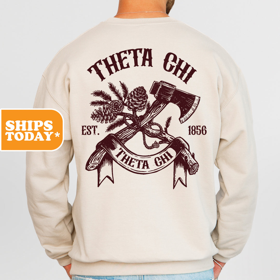 a man wearing a sweatshirt with a hammer and pine tree on it