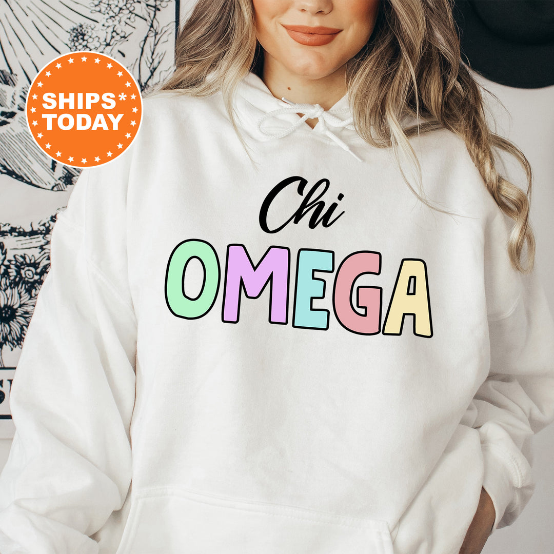 a woman wearing a white hoodie that says ohi omega