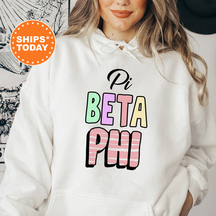 a woman wearing a white hoodie with the words ph beta ph on it