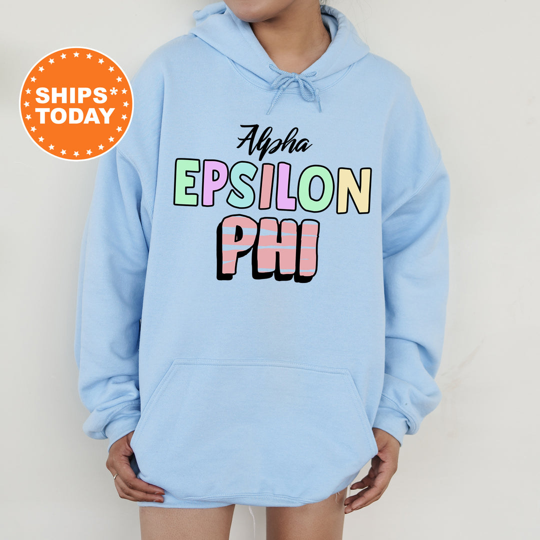 a woman wearing a light blue hoodie with the words epiloon ph on