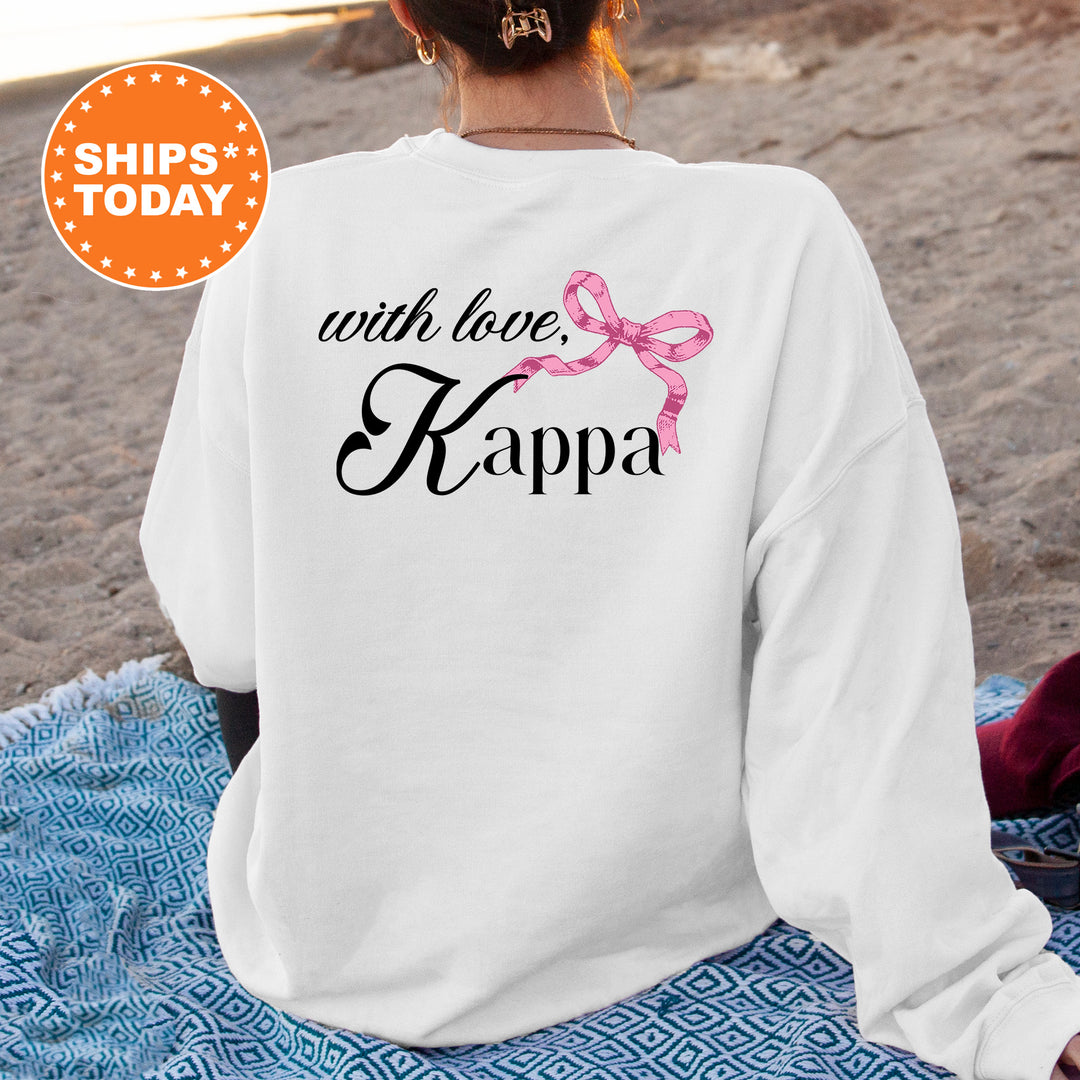 a woman sitting on a towel on the beach