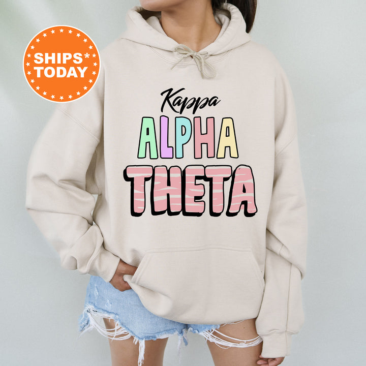 a woman wearing a hoodie that says happy alpha thera