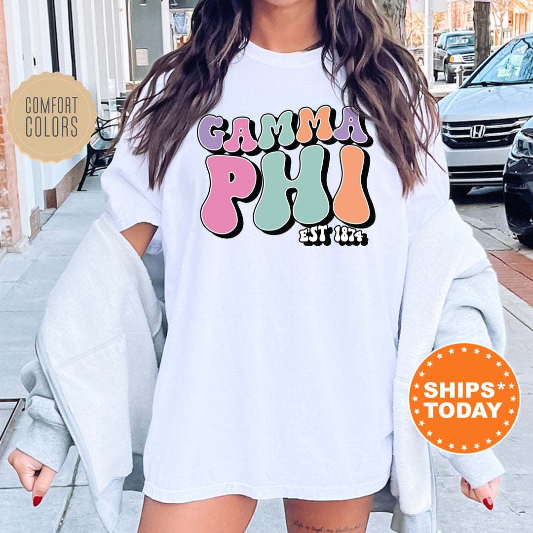 a woman wearing a white shirt with the words gummy pup on it