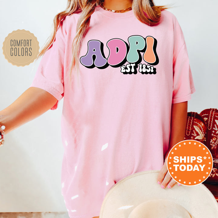 a woman wearing a pink shirt and hat