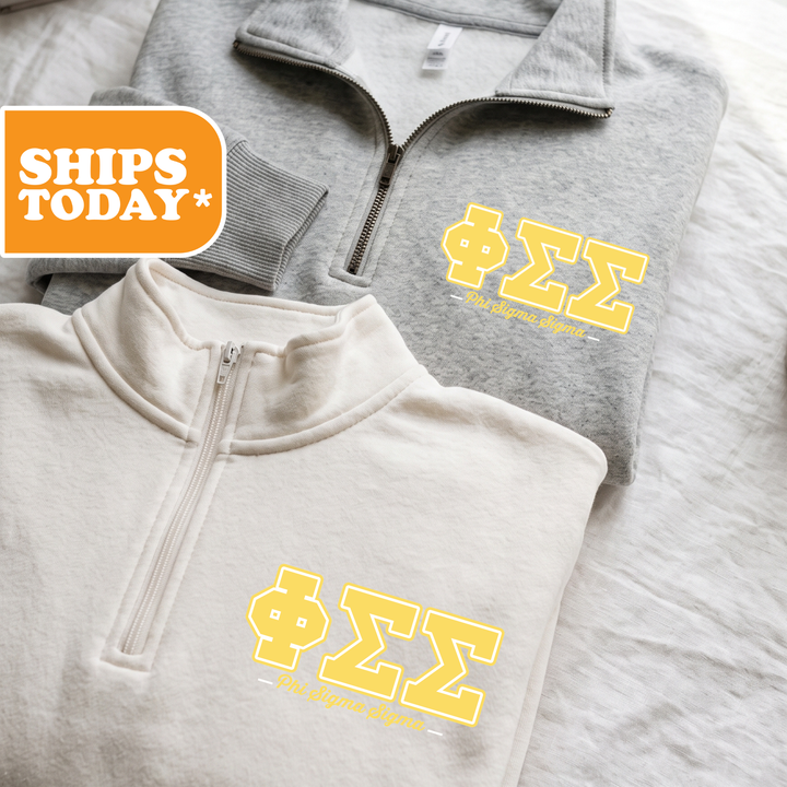 Two gray zip-up jackets with the Greek letters "ΚΥΛΑΣ" printed on them, along with the text "The Sigma Delta Epsilon fraternity" printed below.