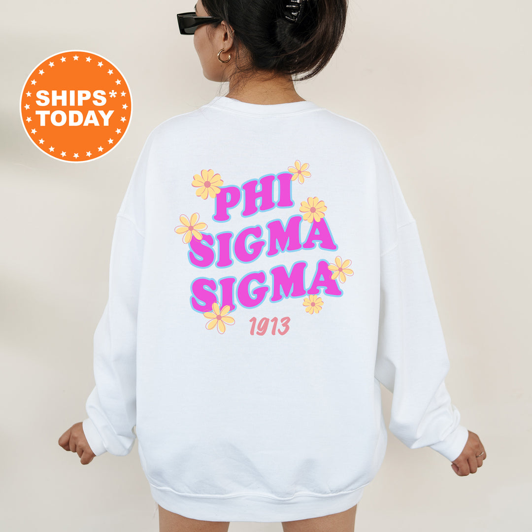 A person wearing a white sweatshirt with the text "PHI SIGMA SIGMA 1913" printed on it.