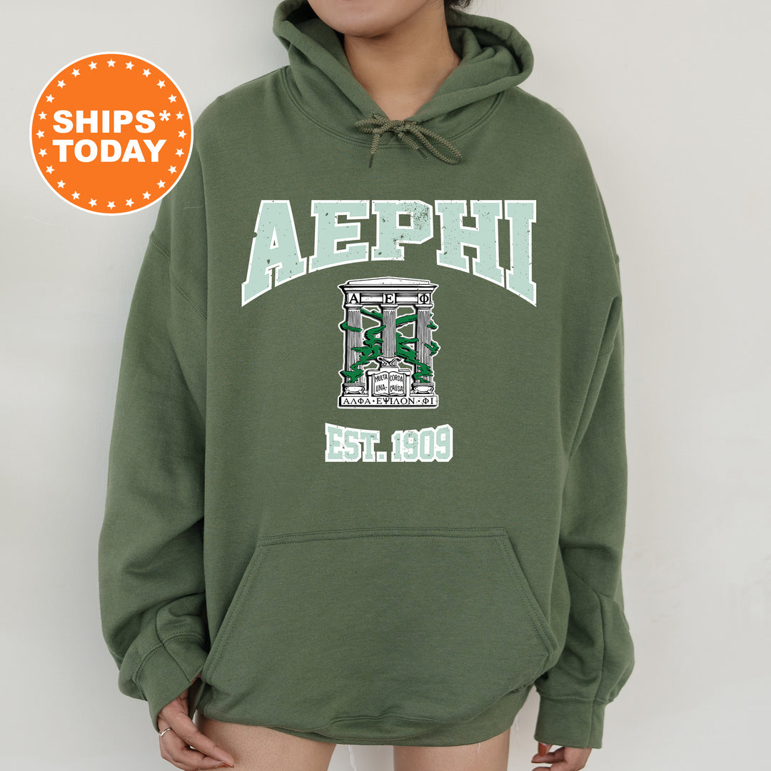 a person wearing a green hoodie with the word aephh on it