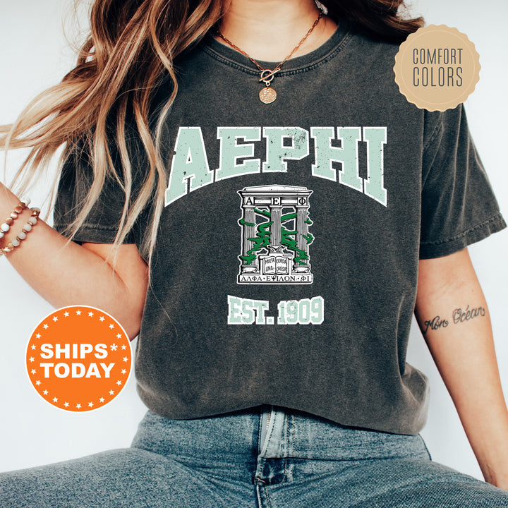 a woman wearing a shirt that says aephh