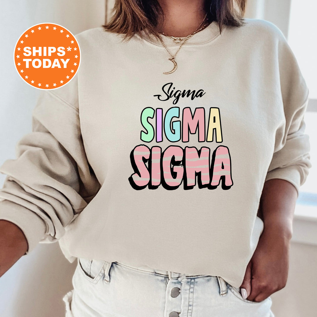 a woman wearing a sweatshirt that says stigmaa stigmaa