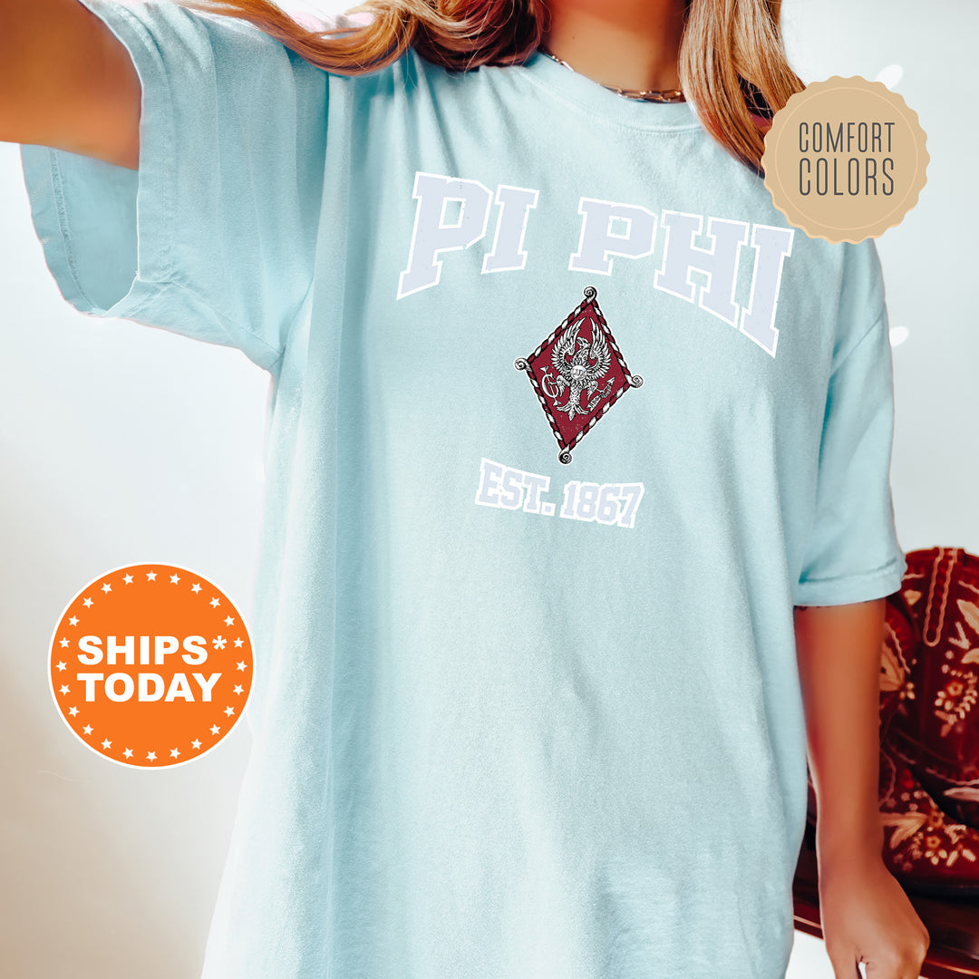 a woman wearing a blue phi phi t - shirt