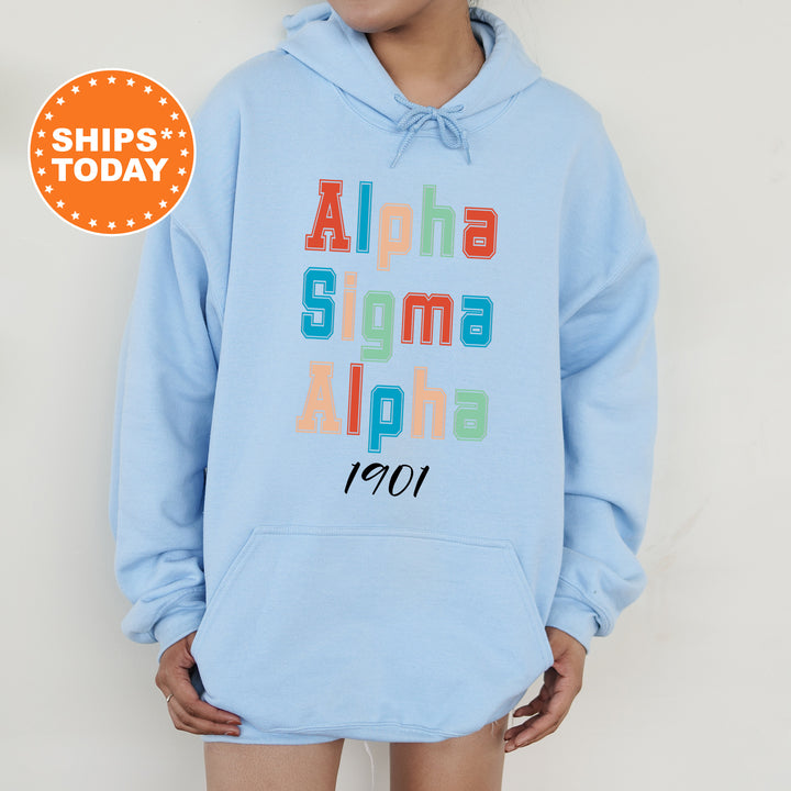a person wearing a blue hoodie that says aloha stigma aloha