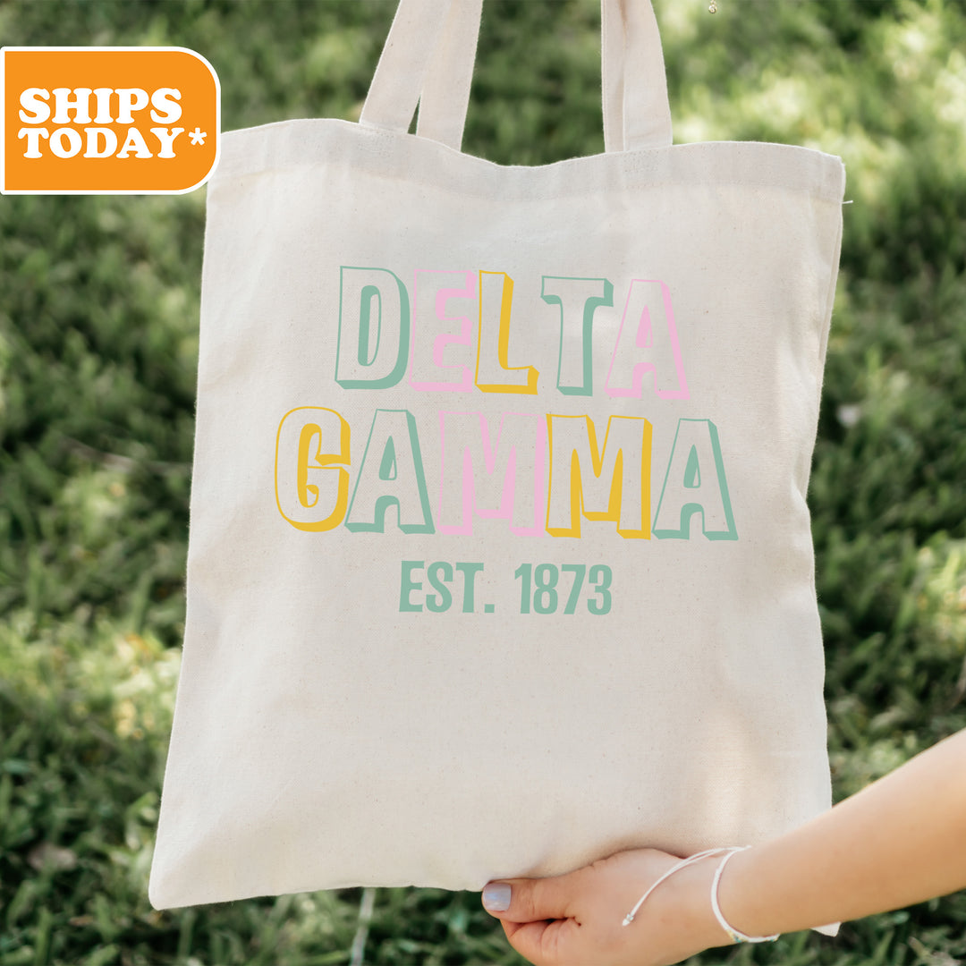 a person holding a bag with the words delta gama on it
