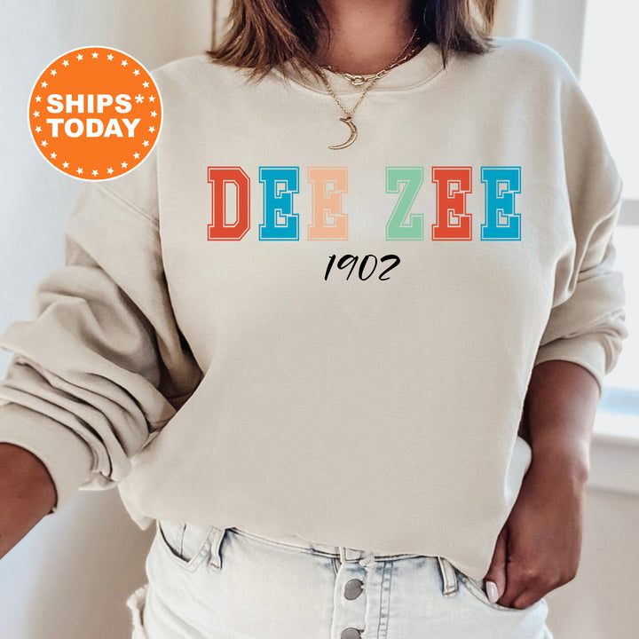 a woman wearing a sweatshirt with the word deze on it