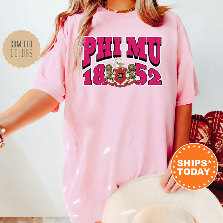 a woman wearing a pink shirt and hat