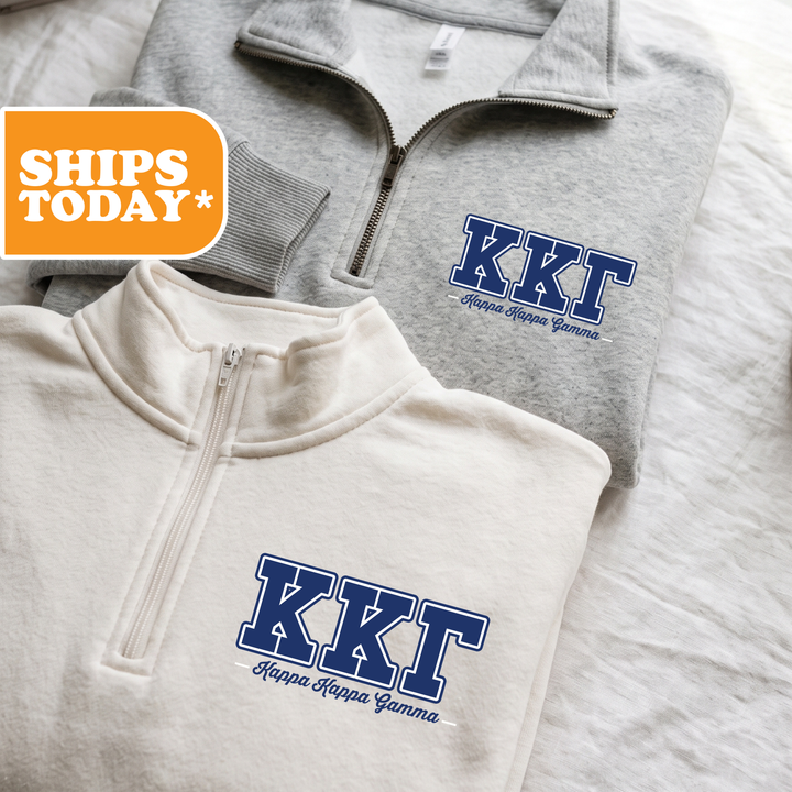 Two grey and white sweatshirts with the letters "KKT" printed on them, along with the text " Kappa Kappa Gamma" printed below.