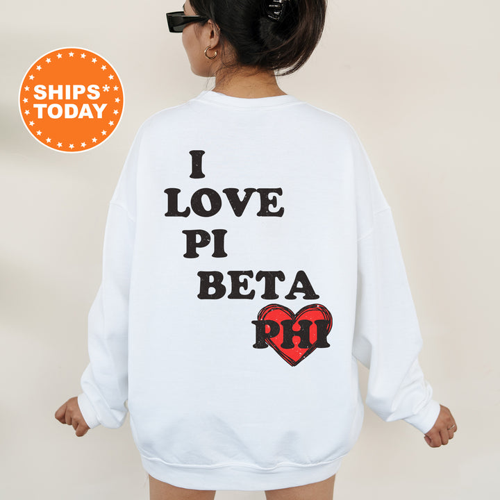 a woman wearing a sweatshirt that says i love pi beta