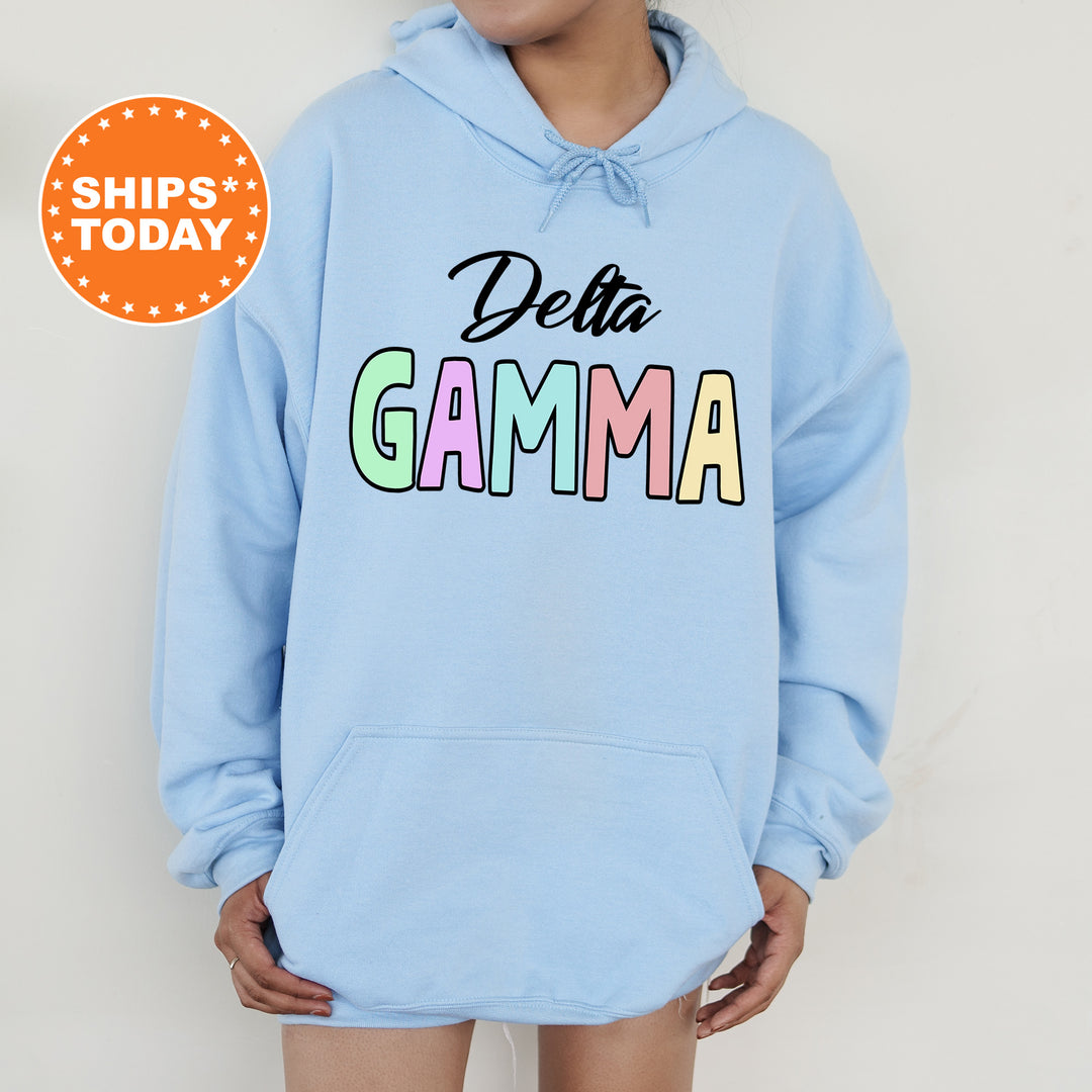 a person wearing a blue hoodie with the words delta gama on it