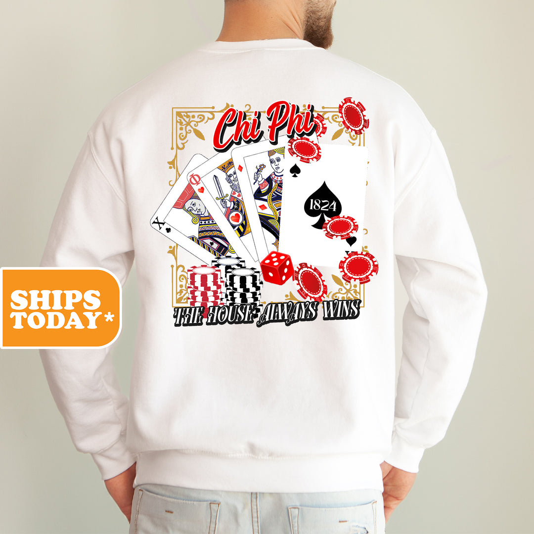 a man wearing a white sweatshirt with a picture of a card player on it
