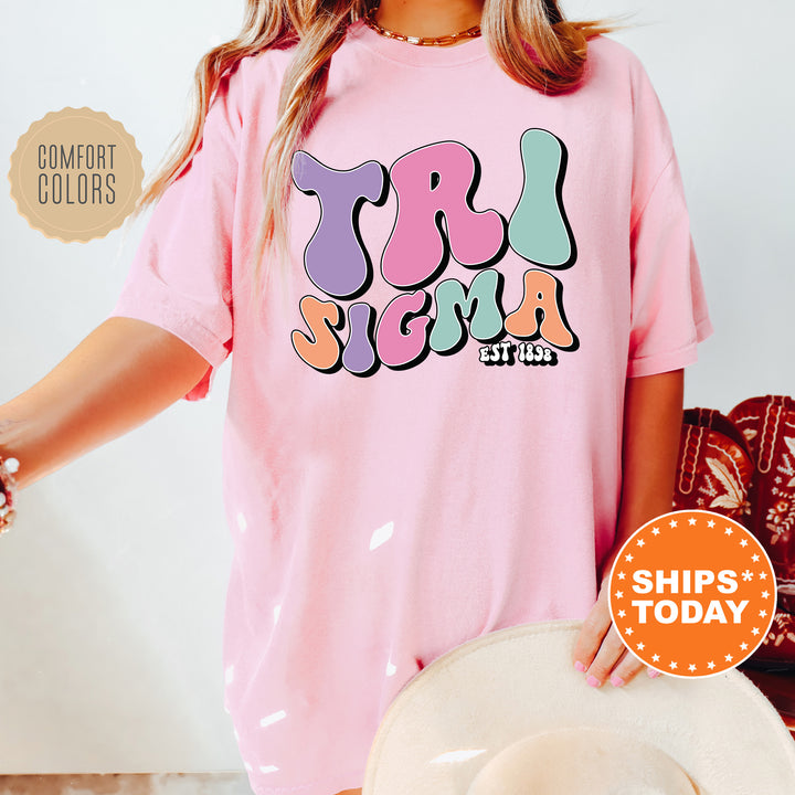 a woman wearing a pink shirt and hat